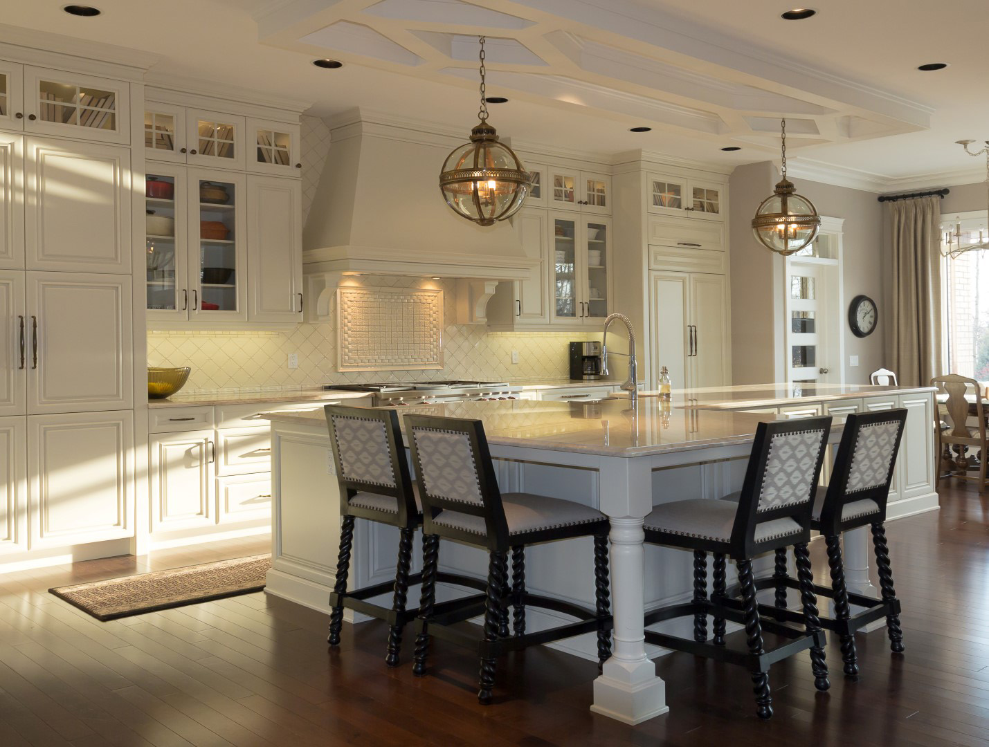 Elegant White Kitchen with Large Eat-In Work Island