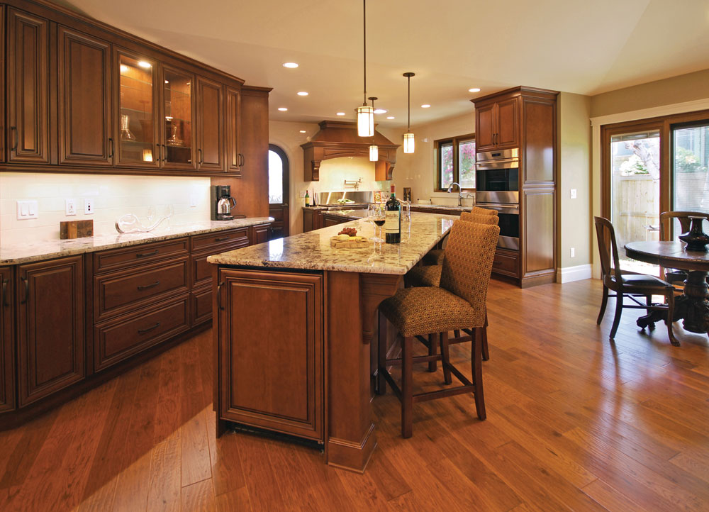 Large Cherry Kitchen with Custom Wood Hood