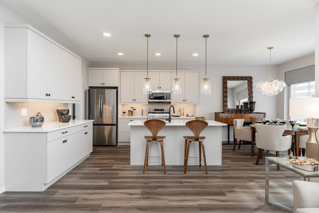 white kitchen with stainless steel appliances, modern style kitchen cabinets