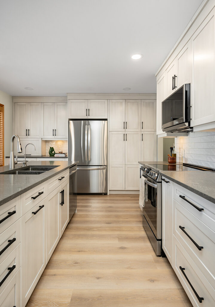 custom-kitchen-storage-fridge-surround-winnipeg