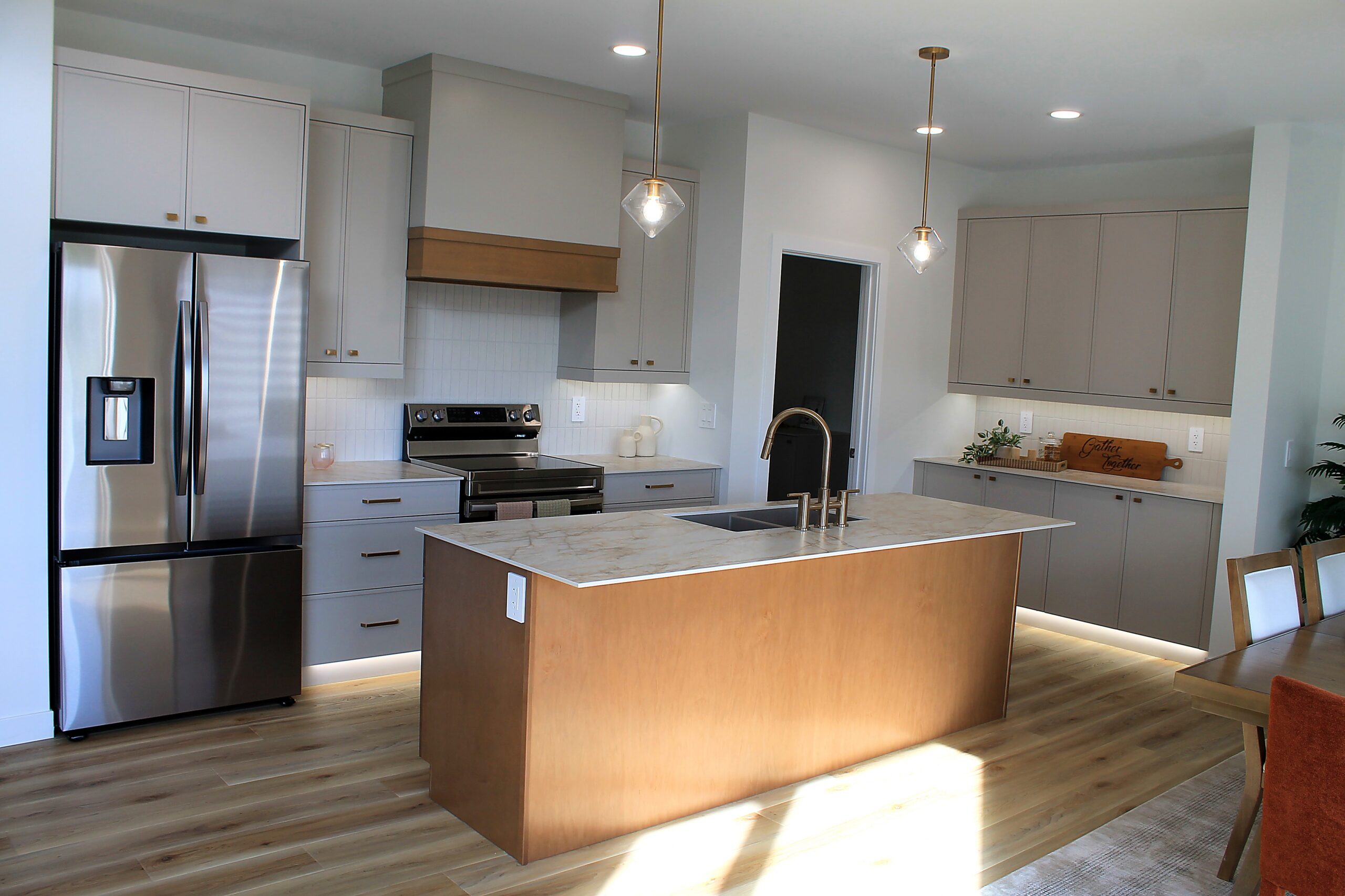 Two Tone Kitchen with Hood Accent and Coffee Bar